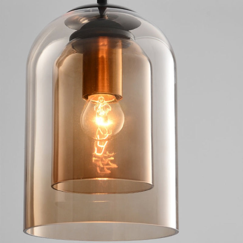Colored Glass Pendant Light with Modern Hanging Design for Ambient Home Lighting
